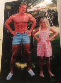 Advocate, Greg, posing with young daugher