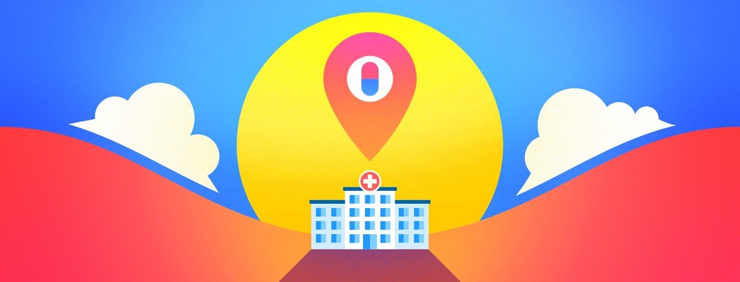 hospital with a location pin over top with sunset in background