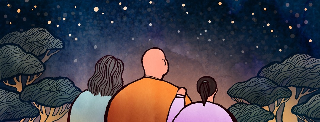 A man is comforted by his family as they look up at a starry night sky together.