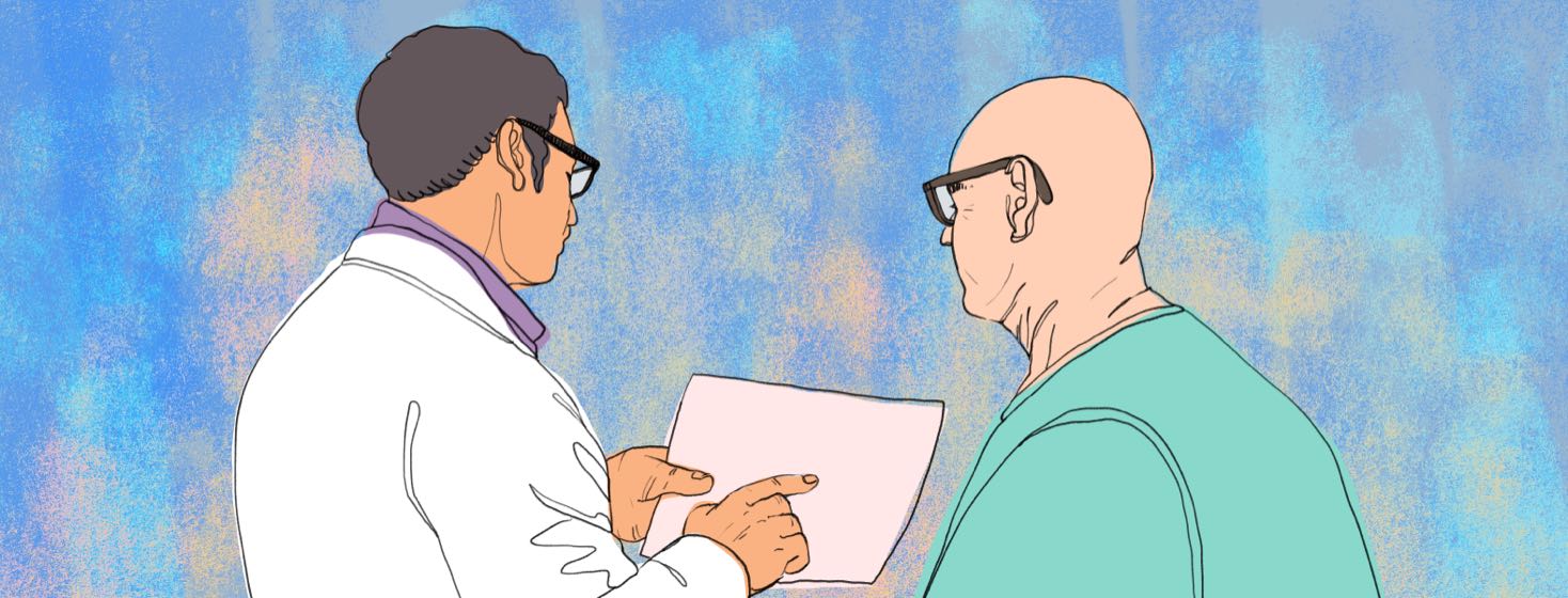 A doctor and patient look at a paper the doctor is holding.